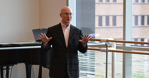 Dr. Evan Collins speaking with Young Musicians